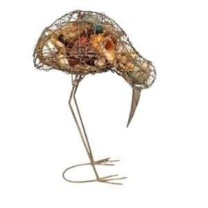 Wire cage sea bird filled with sea shells. 16 inches tall & 13 inches wide.